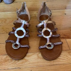 Flat sandals with zip up heal and ankle strap